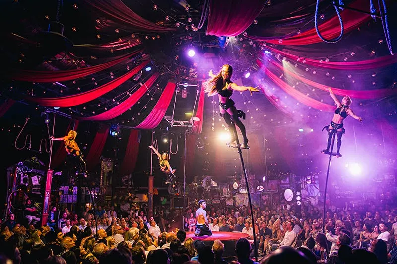 Absinthe circus performers on aerial rigging above the Spiegeltent stage at Caesars Palace Las Vegas
