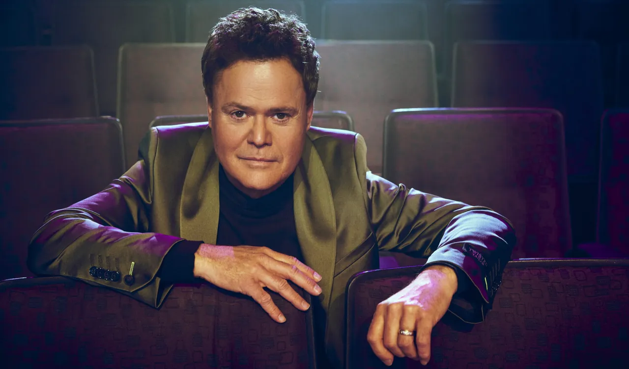 Donny Osmond seated in Harrah's Showroom at Harrah's Las Vegas ahead of his residency's fifth anniversary