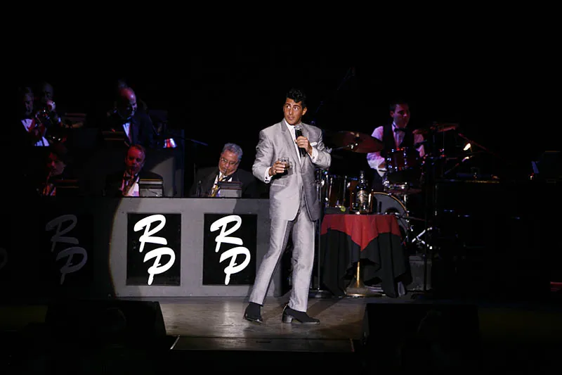 Dean Martin tribute performer on stage with the live big band at The Rat Pack Is Back!