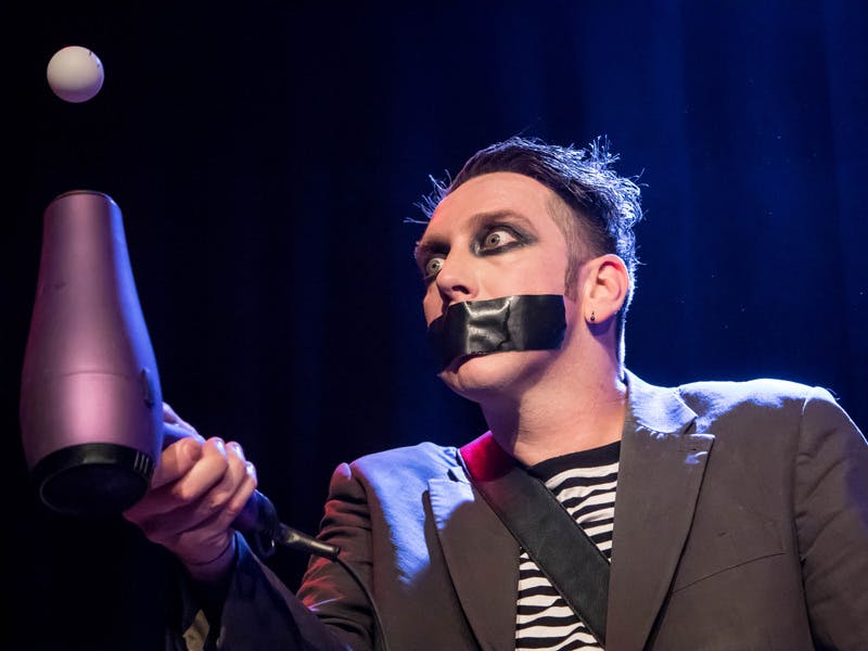 Tape Face with props on stage in Las Vegas