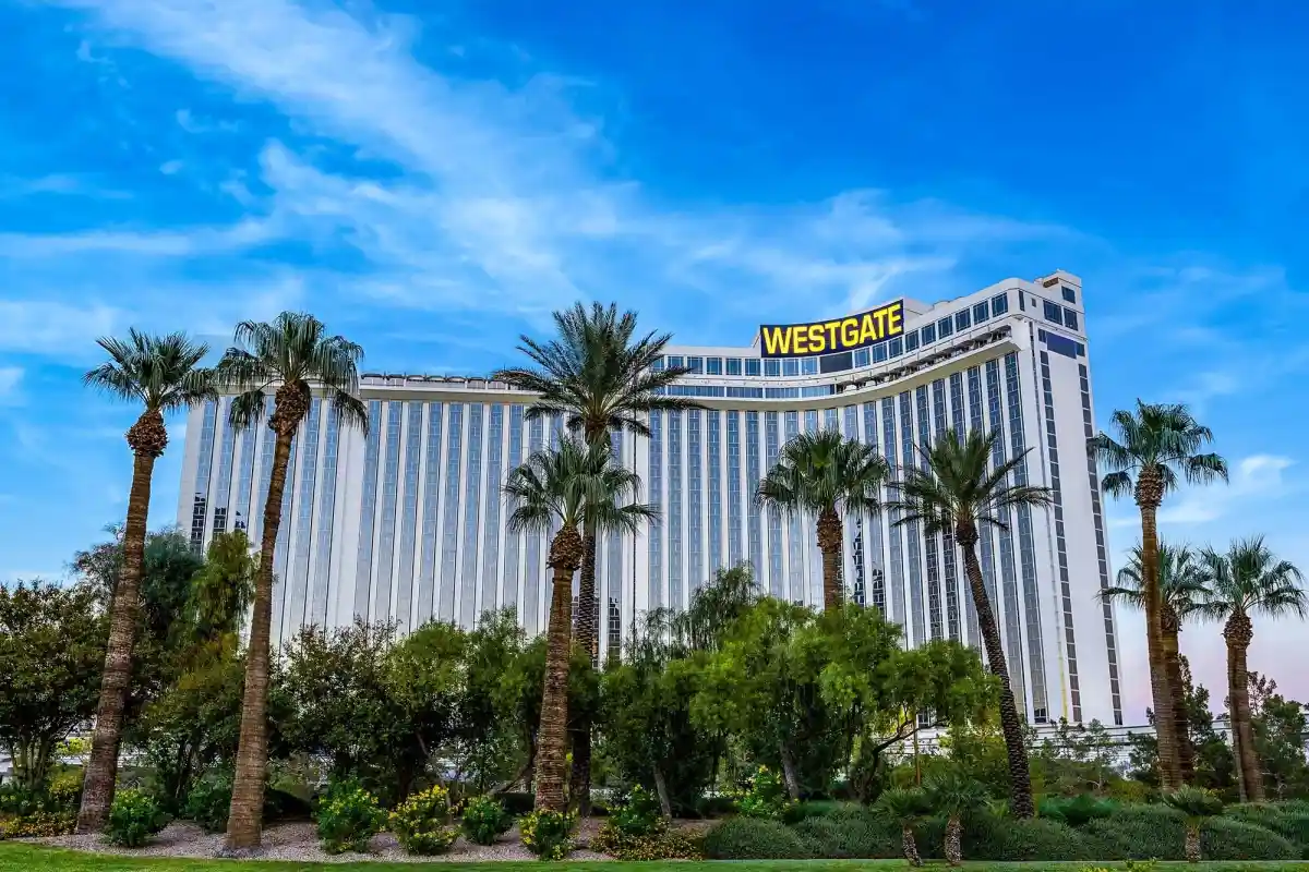 Westgate Las Vegas Resort & Casino exterior with palm trees — home of The King Comes Home Elvis tribute